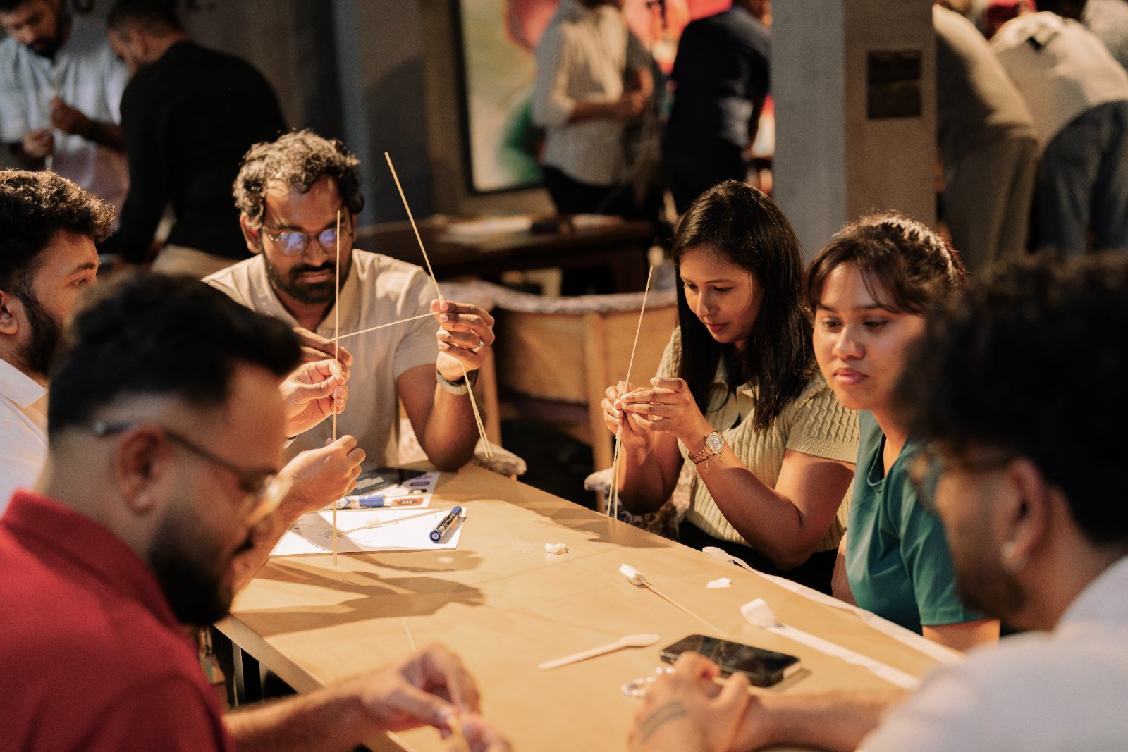 Designers working together on a hands-on activity at a meetup