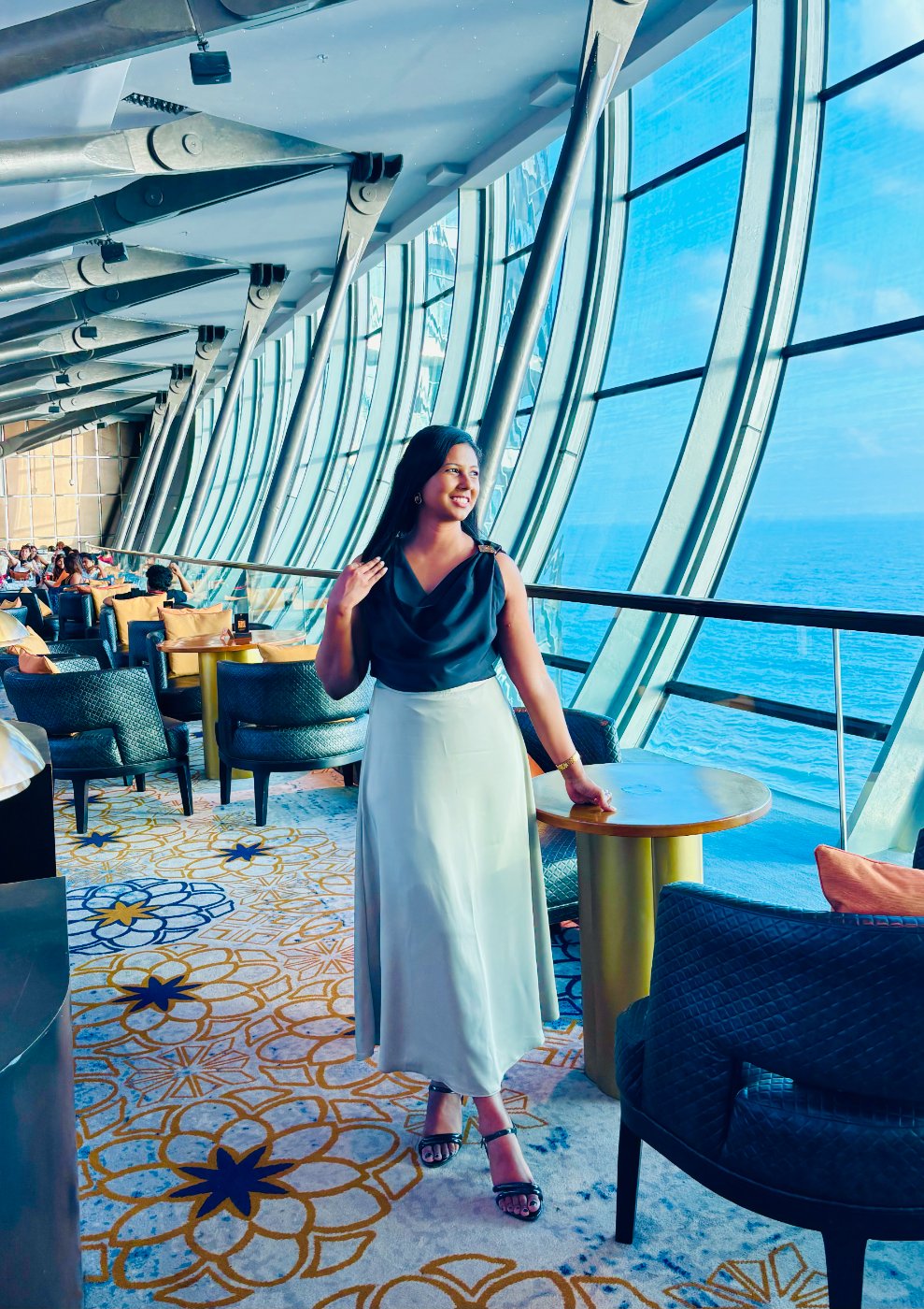 Looking out over the ocean from a high glass-walled lounge